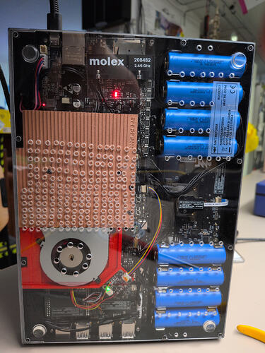 Bottom plate has been mounted again. It is riddled by hand drilled holes.